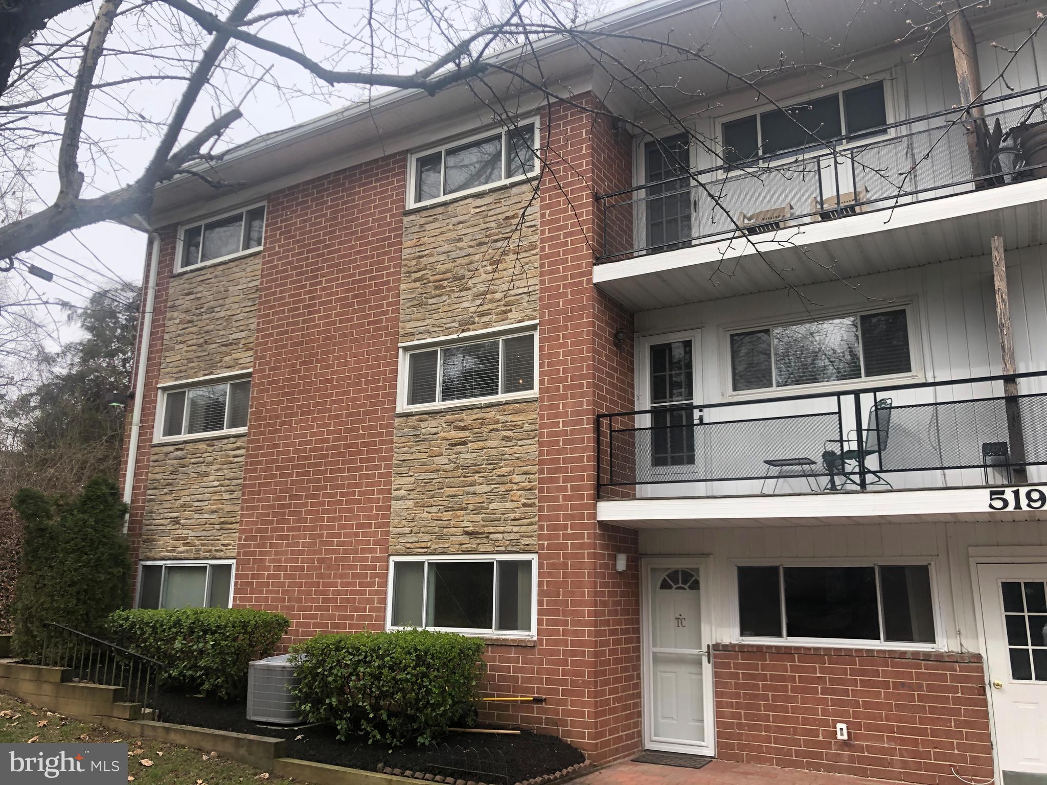 519 Epsom Road, Unit 1C Baltimore, MD 21286 - Photo 1 of 54 a front view of a house with a yard