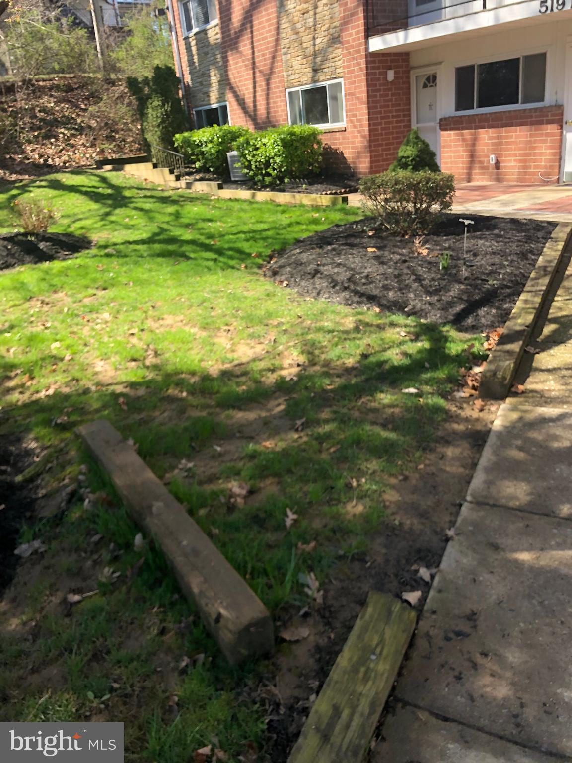 519 Epsom Road, Unit 1C Baltimore, MD 21286 - Photo 11 of 54 a view of a house with a yard