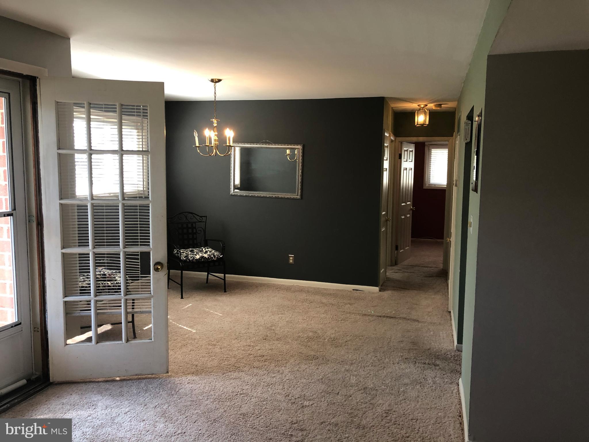 519 Epsom Road, Unit 1C Baltimore, MD 21286 - Photo 20 of 54 a view of an empty room with a window
