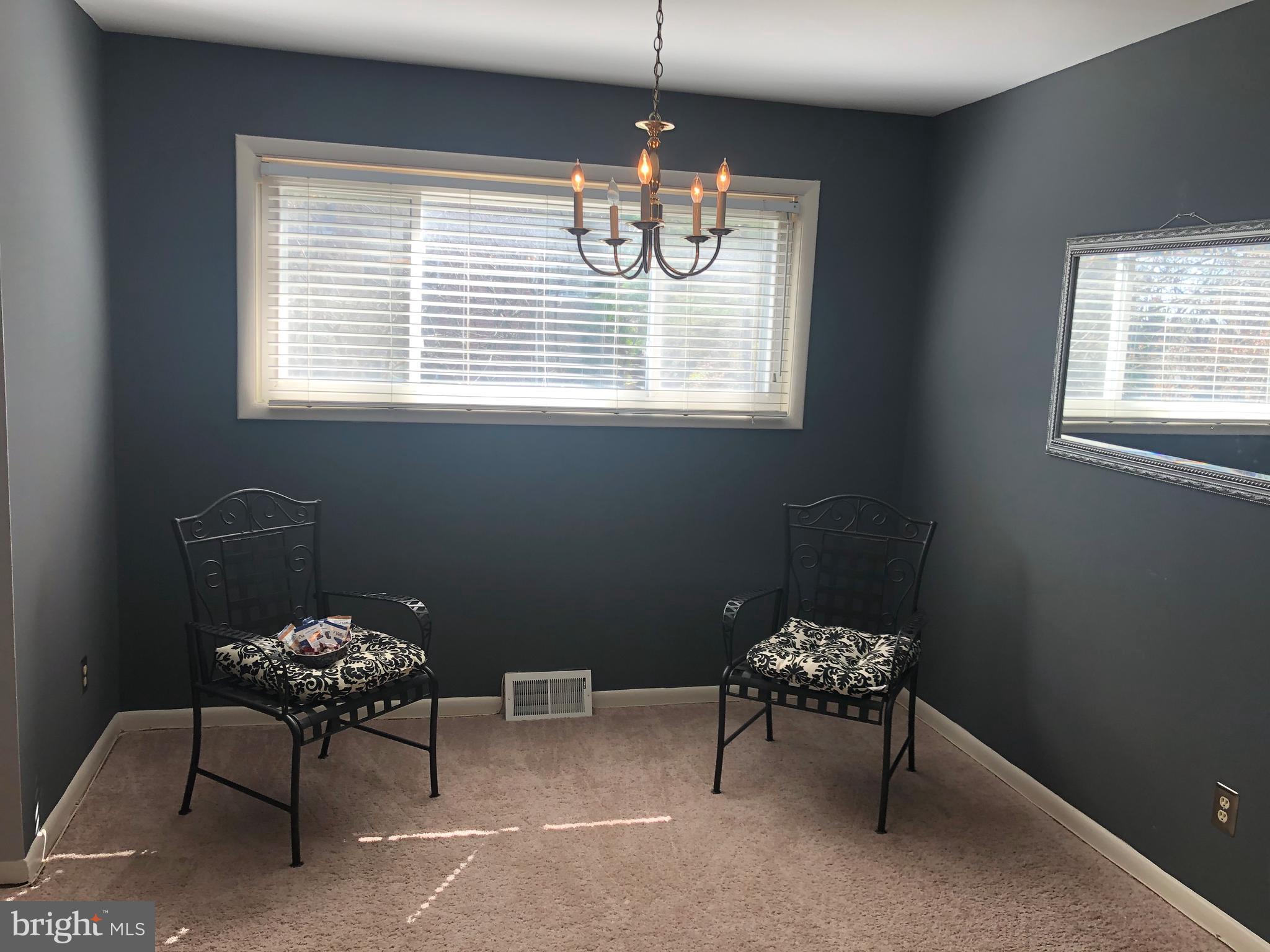 519 Epsom Road, Unit 1C Baltimore, MD 21286 - Photo 23 of 54 a dining room with furniture and window