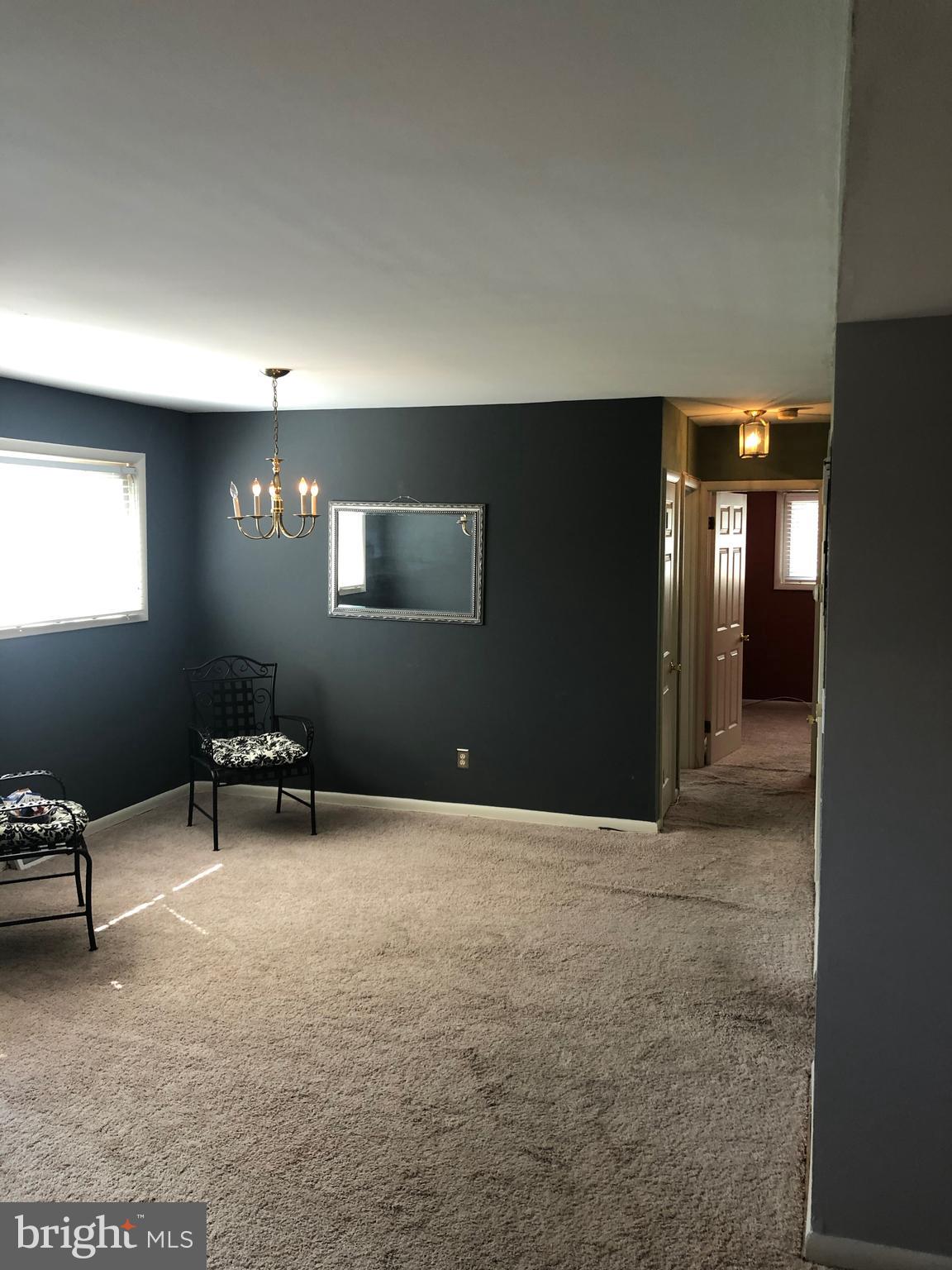 519 Epsom Road, Unit 1C Baltimore, MD 21286 - Photo 25 of 54 a view of a livingroom with furniture