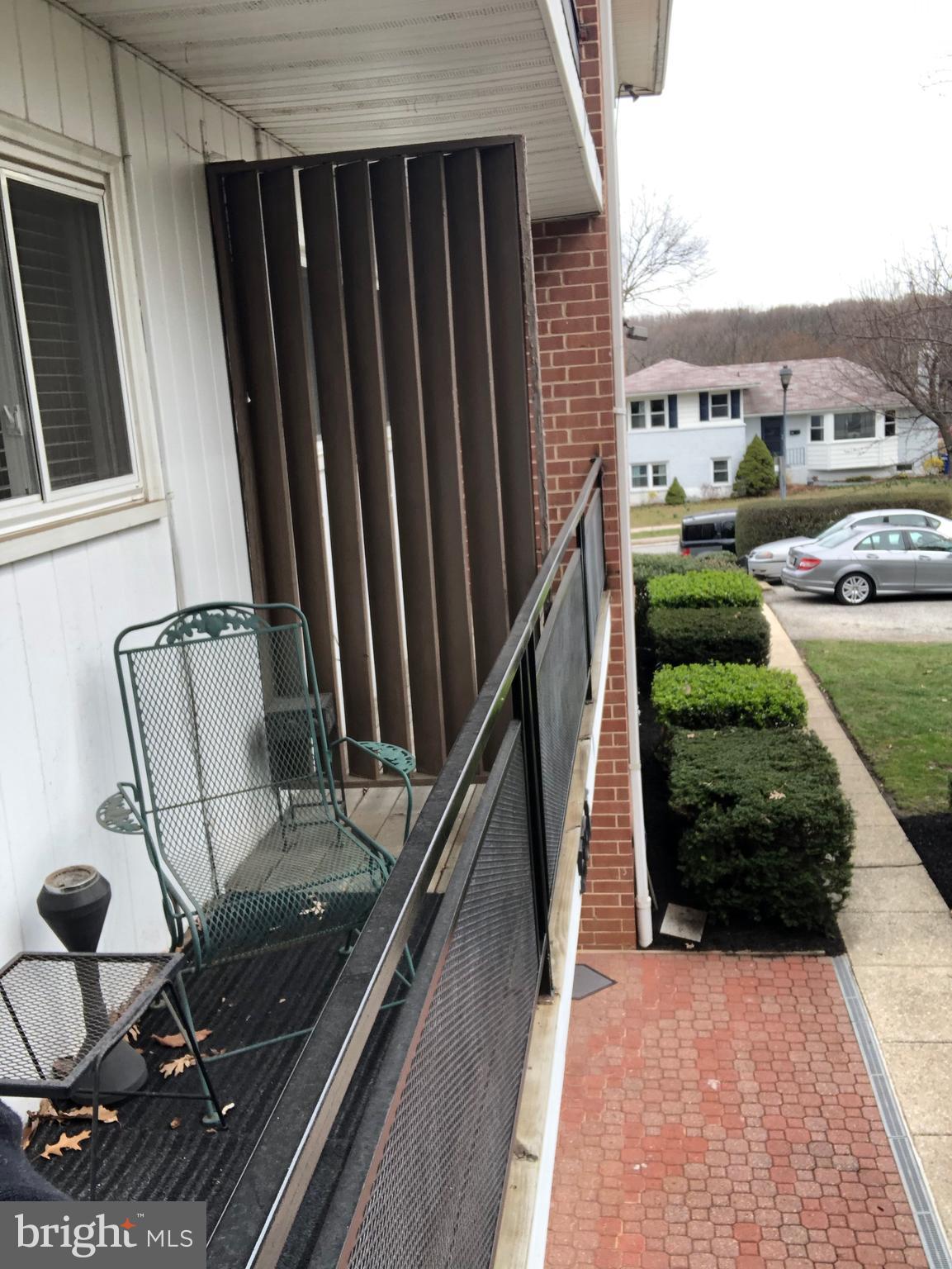 519 Epsom Road, Unit 1C Baltimore, MD 21286 - Photo 5 of 54 a view of a balcony with chairs