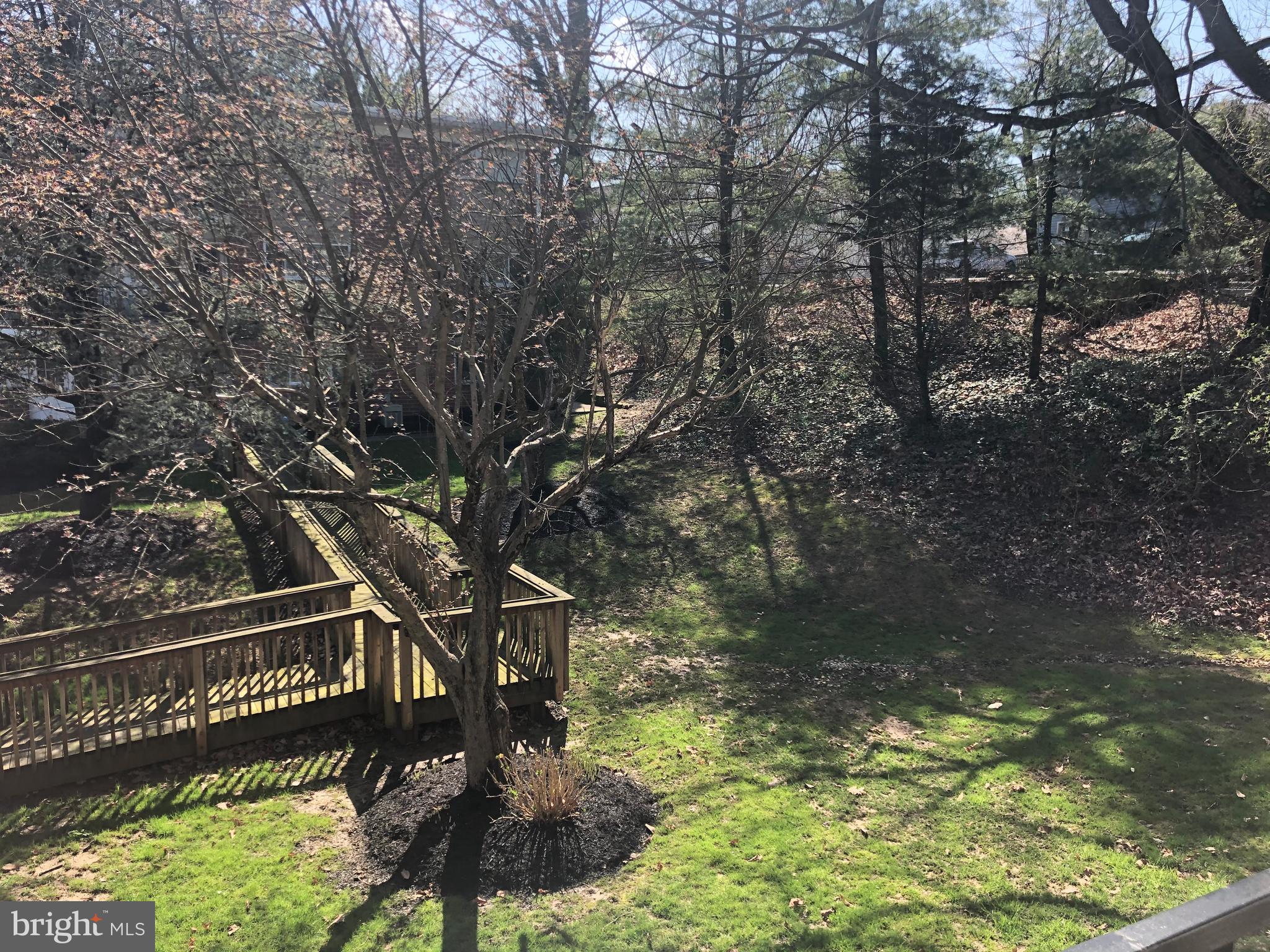 519 Epsom Road, Unit 1C Baltimore, MD 21286 - Photo 50 of 54 a balcony with trees