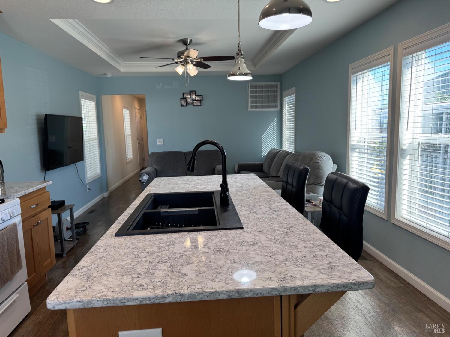 62 Romani Court Santa Rosa, CA 95407 - Photo 16 of 32 a kitchen with a table chairs and a refrigerator