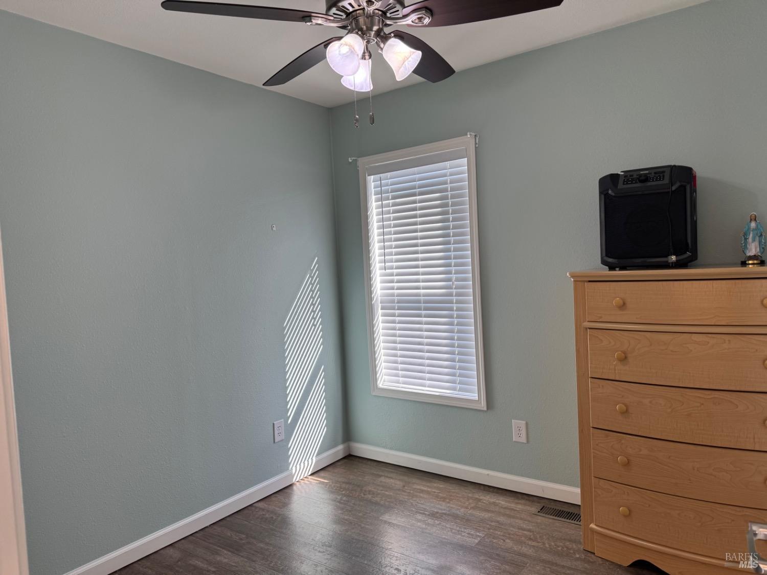 62 Romani Court Santa Rosa, CA 95407 - Photo 19 of 32 a room with a flat screen tv and a window