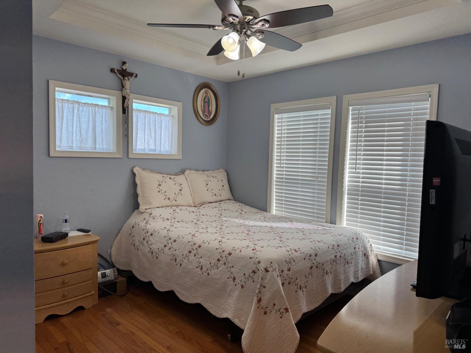 62 Romani Court Santa Rosa, CA 95407 - Photo 21 of 32 a bedroom with a bed and a window