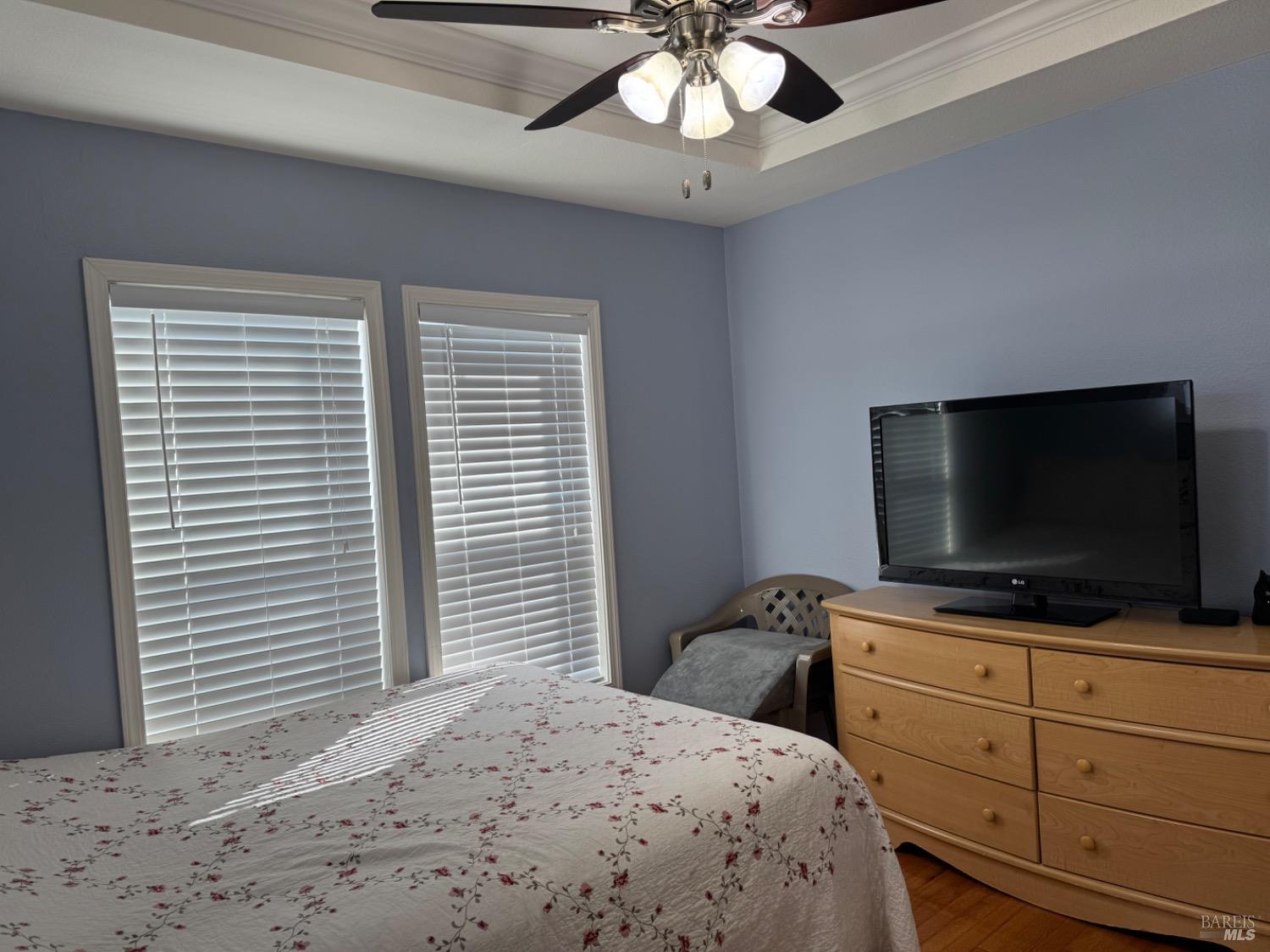 62 Romani Court Santa Rosa, CA 95407 - Photo 24 of 32 a bedroom with a bed and a flat screen tv