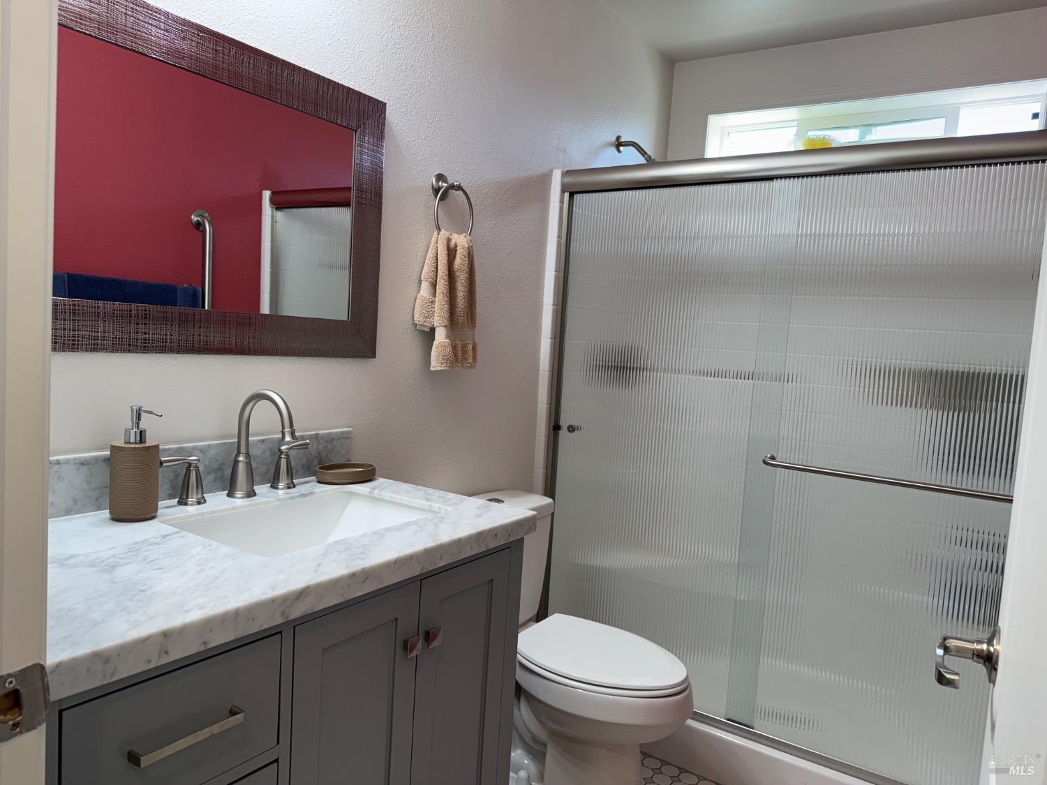 62 Romani Court Santa Rosa, CA 95407 - Photo 27 of 32 a bathroom with a sink and a mirror