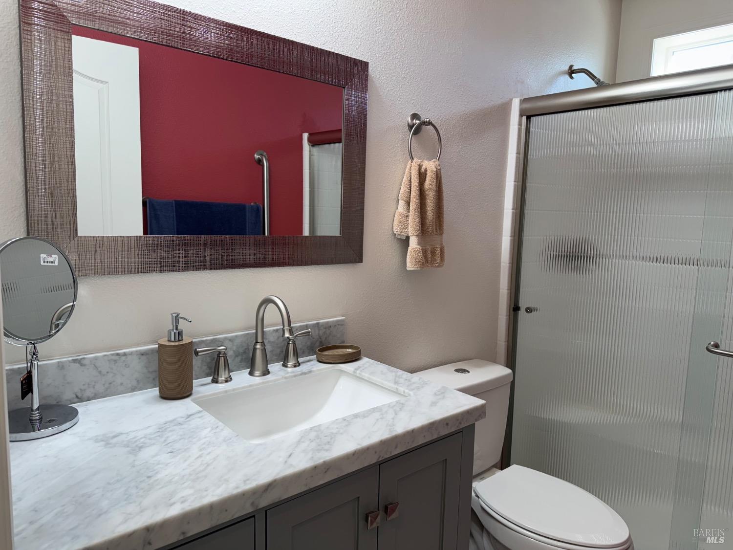 62 Romani Court Santa Rosa, CA 95407 - Photo 28 of 32 a bathroom with a granite countertop sink toilet and shower