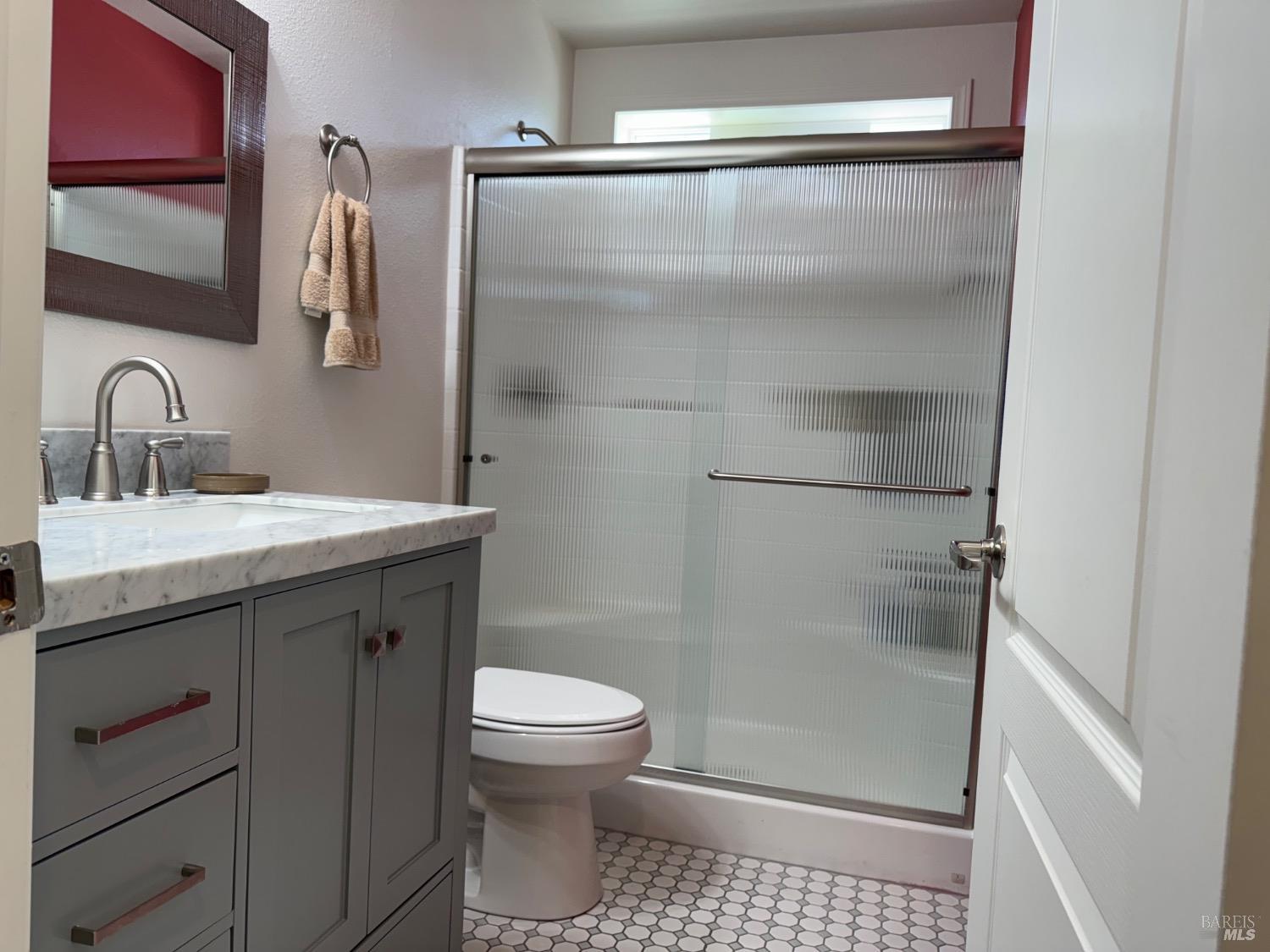 62 Romani Court Santa Rosa, CA 95407 - Photo 29 of 32 a bathroom with a sink a toilet and shower