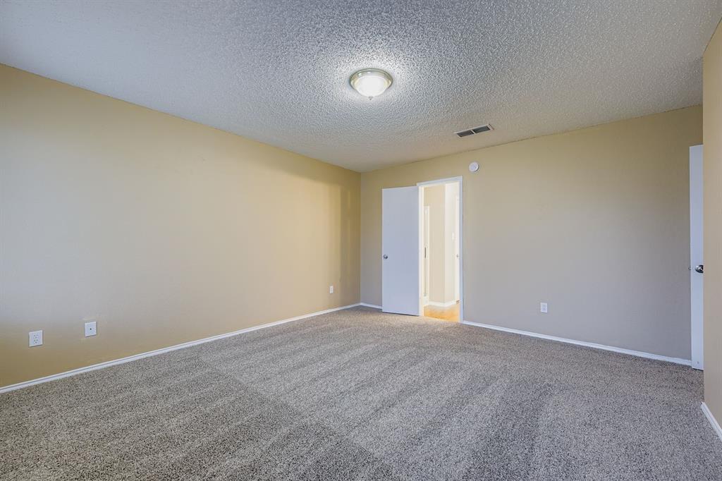3326 Spring Meadow Lane Grand Prairie, TX 75052 - Photo 11 of 22 a view of an empty room