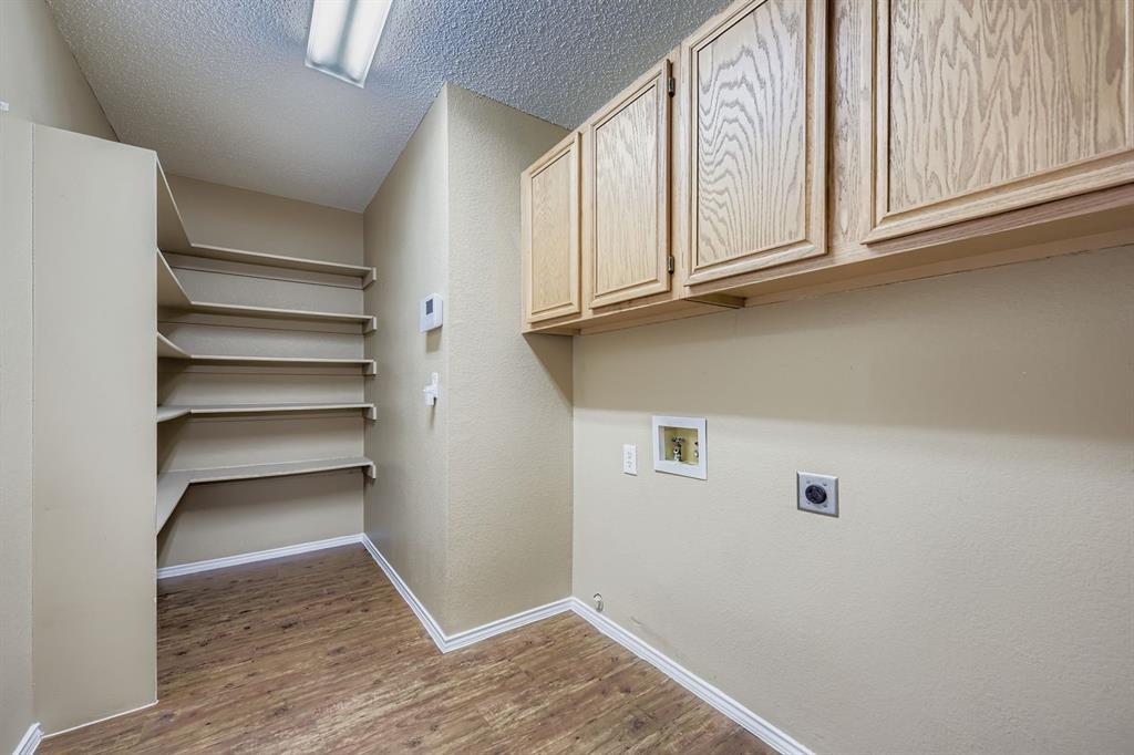 3326 Spring Meadow Lane Grand Prairie, TX 75052 - Photo 19 of 22 a view of an empty room with a window