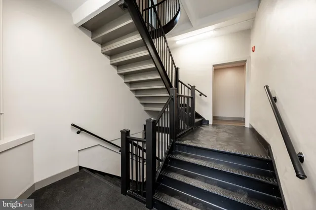 a view of bathroom with washer and dryer