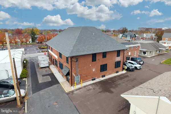 a kitchen with stainless steel appliances a refrigerator and a stove top oven