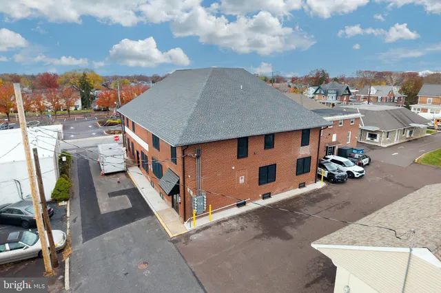 a kitchen with stainless steel appliances a refrigerator and a stove top oven