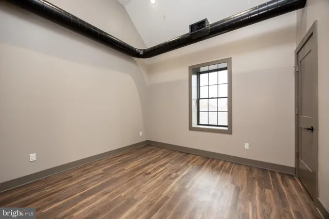a front view of a house with glass windows
