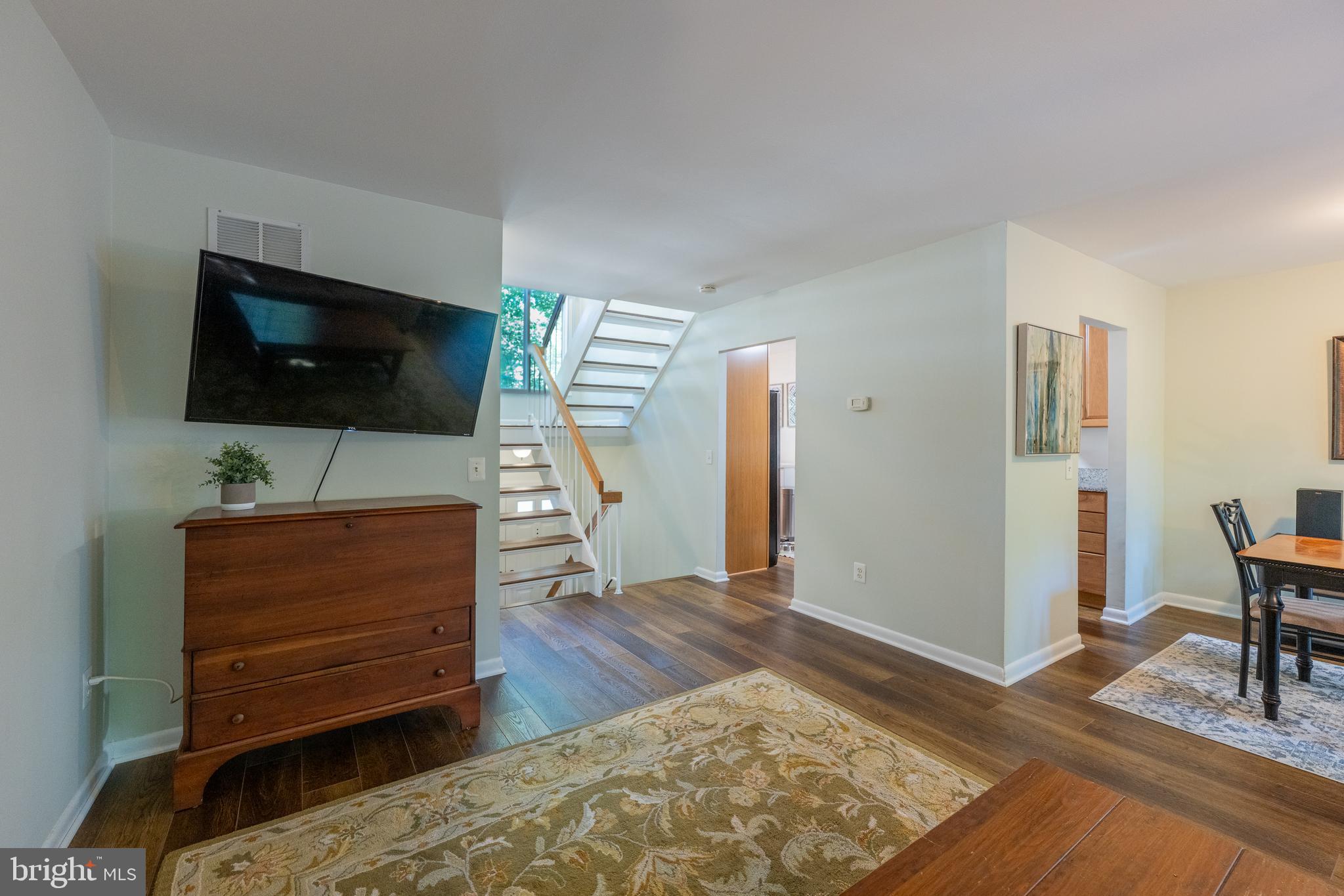 11917 Barrel Cooper Court Reston, VA 20191 - Photo 22 of 59 a view of room with furniture and wooden floor