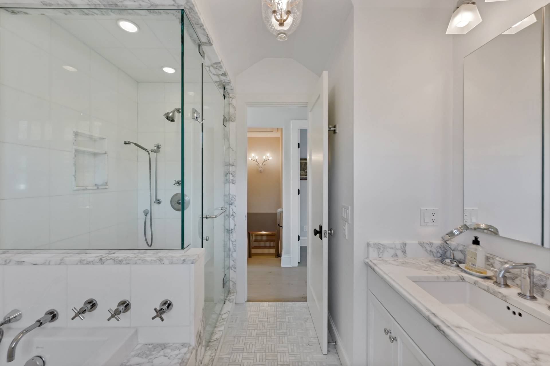 5 Ridge Drive Sag Harbor, NY 11963 - Photo 11 of 27 a bathroom with a tub sink and mirror