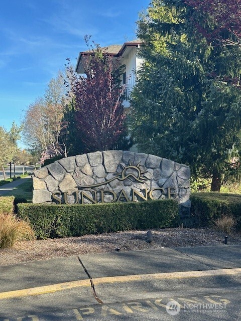 23943 Northeast 115th Lane, Unit 204 Redmond, WA 98053 - Photo 2 of 24 a view of a street