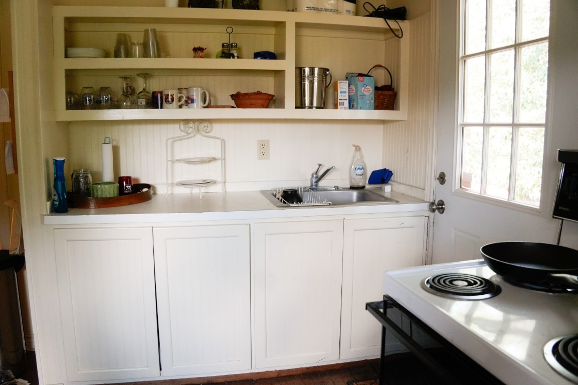 1400 Fm 609 Road Muldoon, TX 78949 - Photo 10 of 24 a kitchen with a sink cabinets and window
