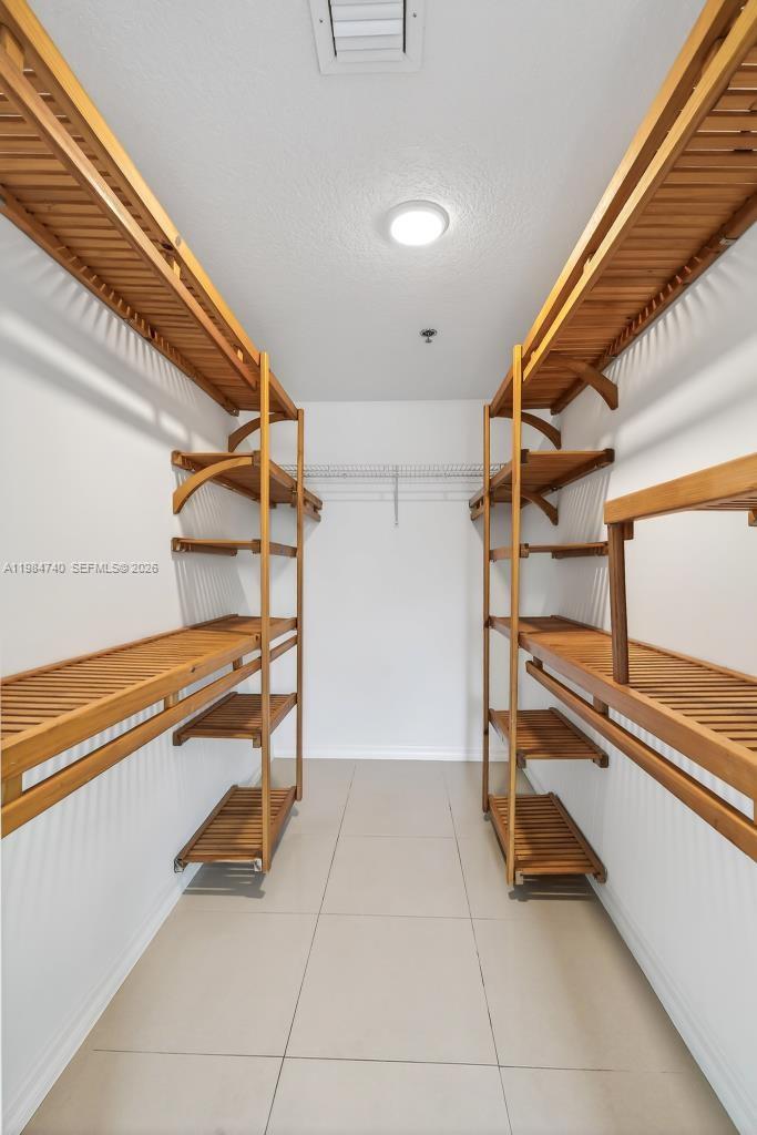 2475 Northwest 16th St Road, Unit 211 Miami, FL 33125 - Photo 18 of 29 a view of an empty room