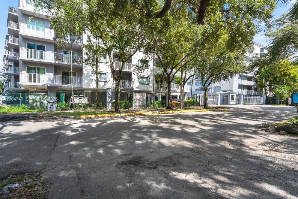 2475 Northwest 16th St Road, Unit 211 Miami, FL 33125 - Photo 5 of 29 a view of city with tall buildings