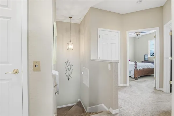 a bathroom with a sink vanity and mirror