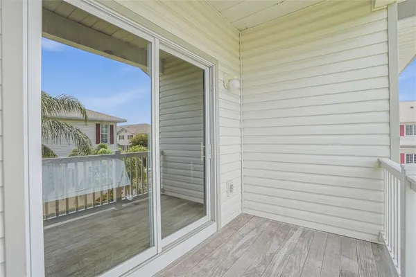 a bathroom with a shower and a glass door