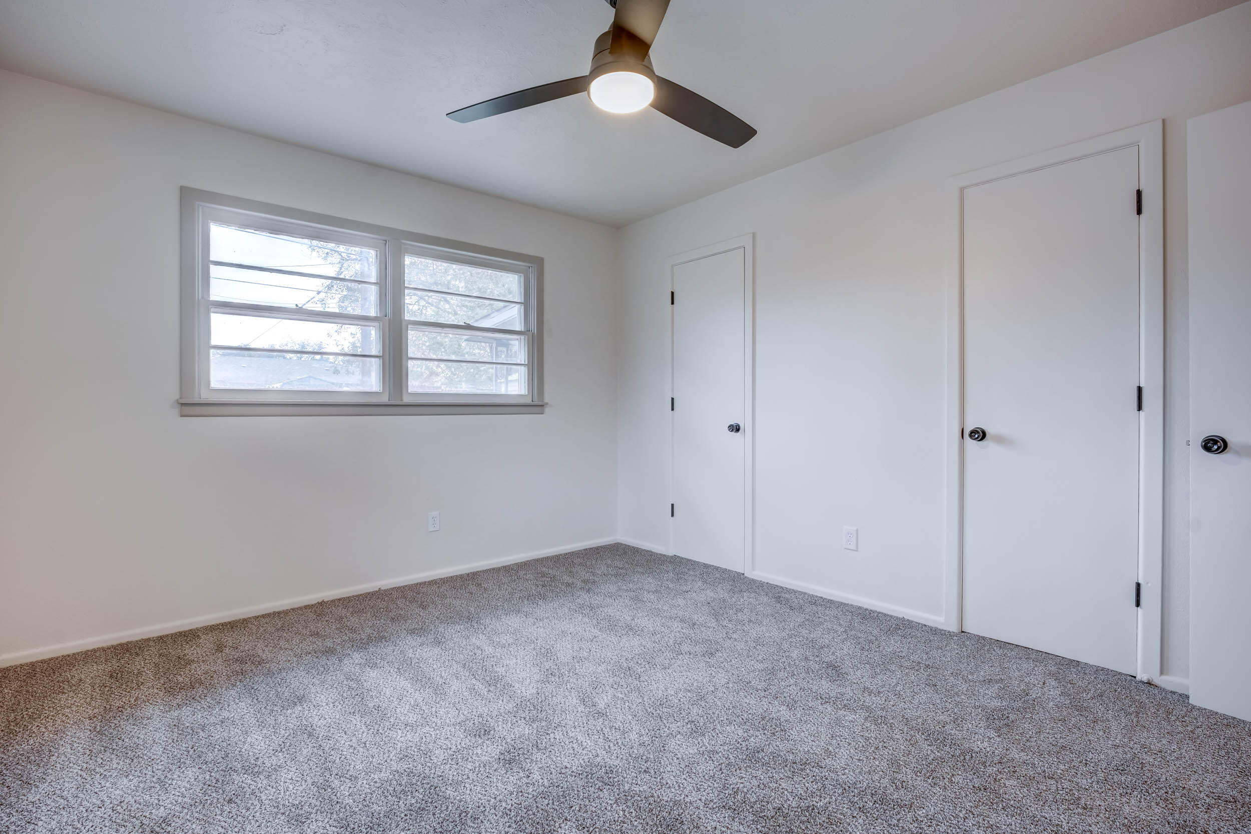 2101 64th Street Lubbock, TX 79412 - Photo 27 of 30 a view of an empty room with a window
