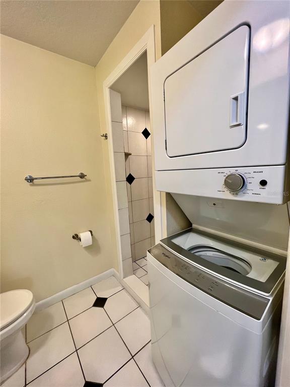 631 North Orange Avenue, Unit 201 Sarasota, FL 34236 - Photo 11 of 14 a bathroom with a sink a toilet and shower