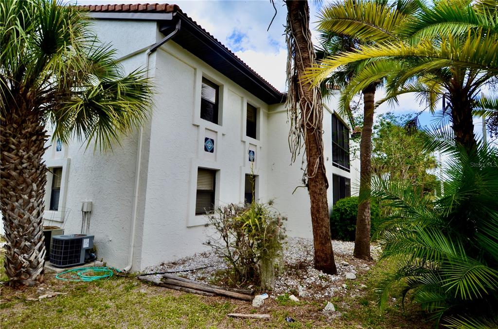 631 North Orange Avenue, Unit 201 Sarasota, FL 34236 - Photo 13 of 14 a front view of a house with garden