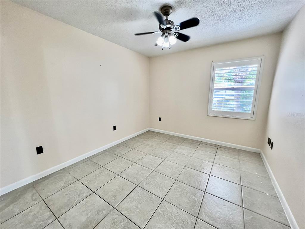 631 North Orange Avenue, Unit 201 Sarasota, FL 34236 - Photo 7 of 14 a view of an empty room with a window