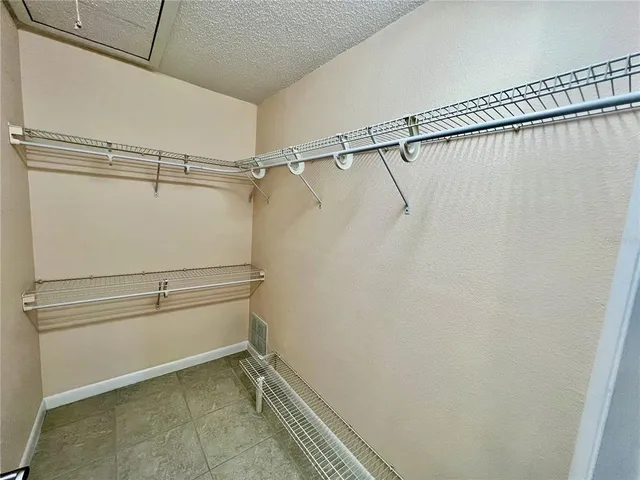 a view of a room with racks on the wall