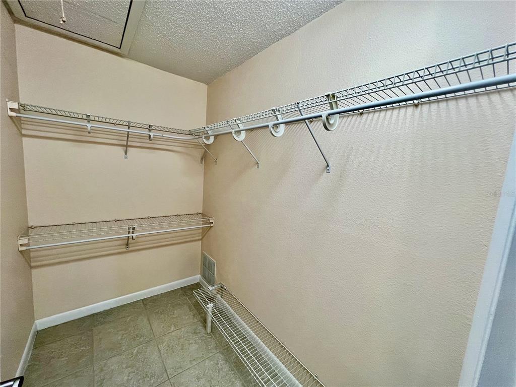 631 North Orange Avenue, Unit 201 Sarasota, FL 34236 - Photo 10 of 14 a view of a room with racks on the wall