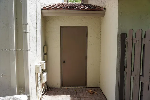 a view of bathroom with a toilet and a shower