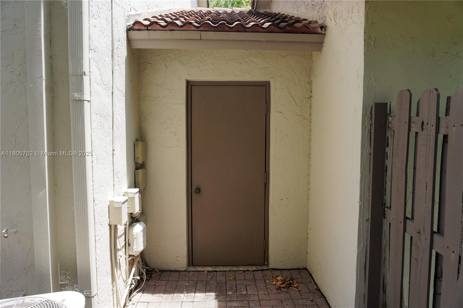 805 Northwest 108th Terrace, Unit 7L5 Pembroke Pines, FL 33026 - Photo 25 of 28 a view of bathroom with a toilet and a shower