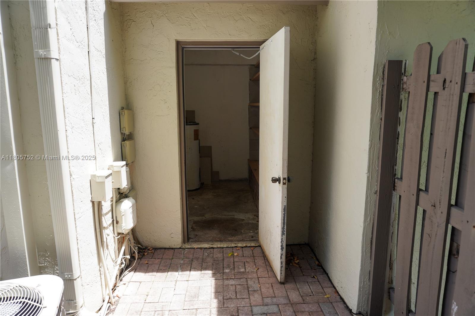 805 Northwest 108th Terrace, Unit 7L5 Pembroke Pines, FL 33026 - Photo 26 of 28 a view of an entryway door