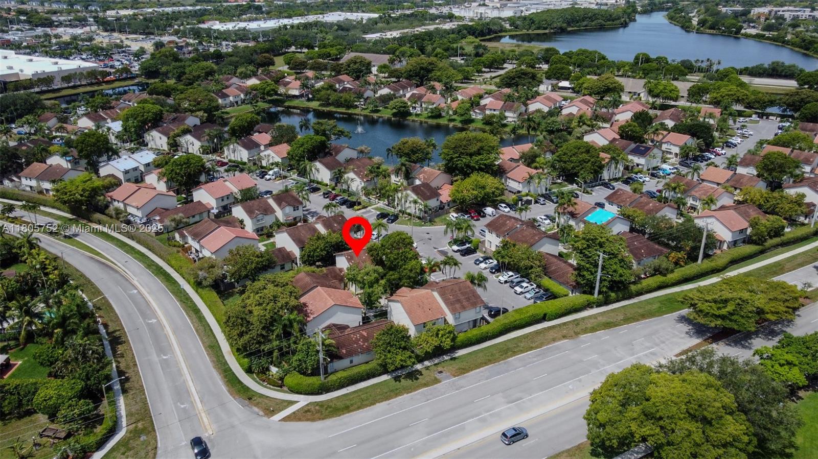 805 Northwest 108th Terrace, Unit 7L5 Pembroke Pines, FL 33026 - Photo 8 of 28 an aerial view of residential house with outdoor space and swimming pool
