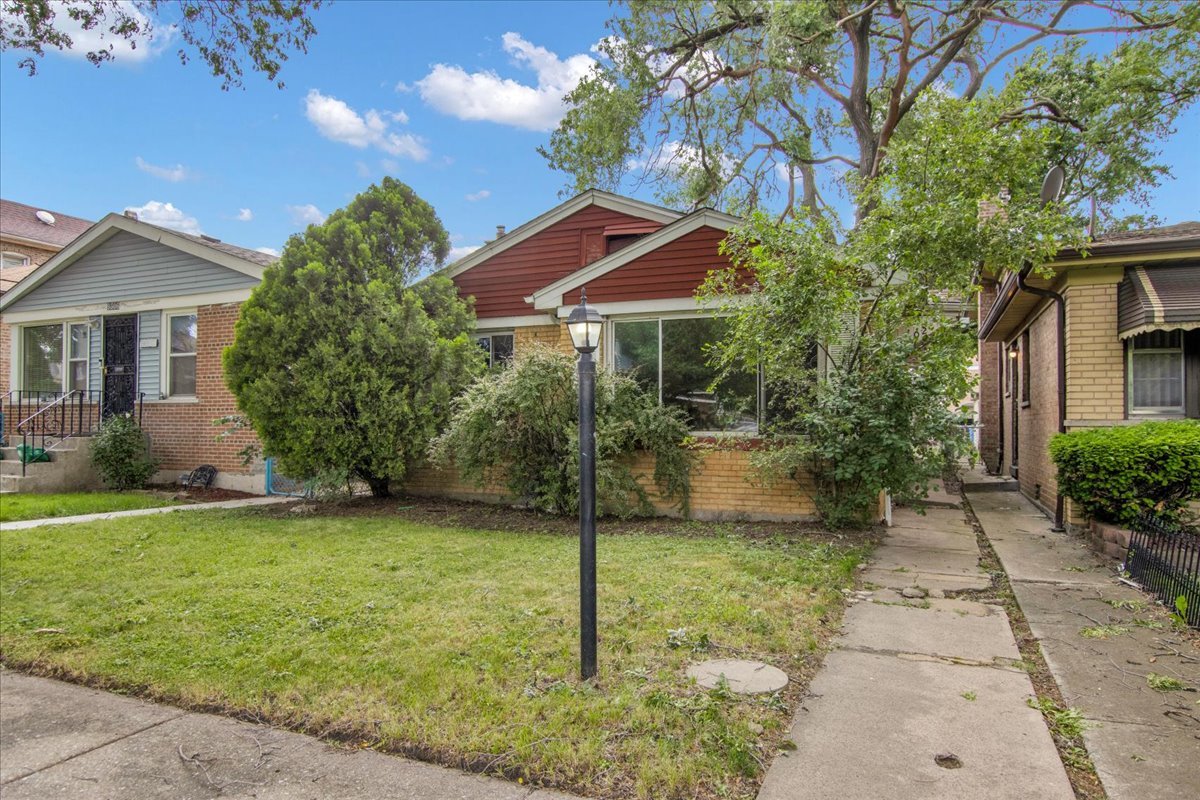9302 South Rhodes Avenue Chicago, IL 60619 - Photo 1 of 21
