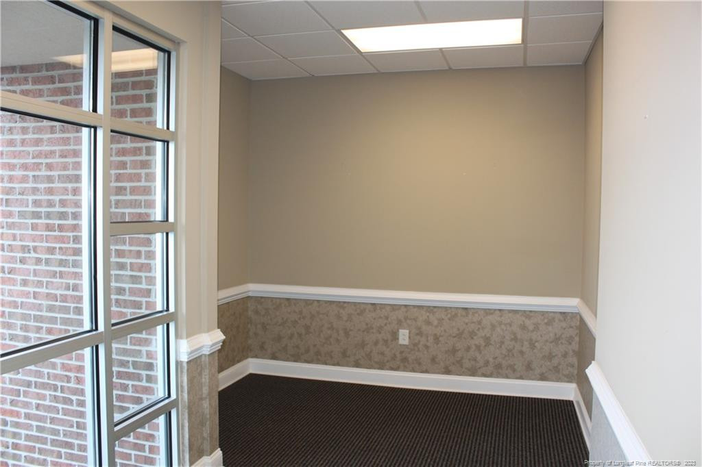 3709 Raeford Road Fayetteville, NC 28304 - Photo 17 of 44 view of room with staircase
