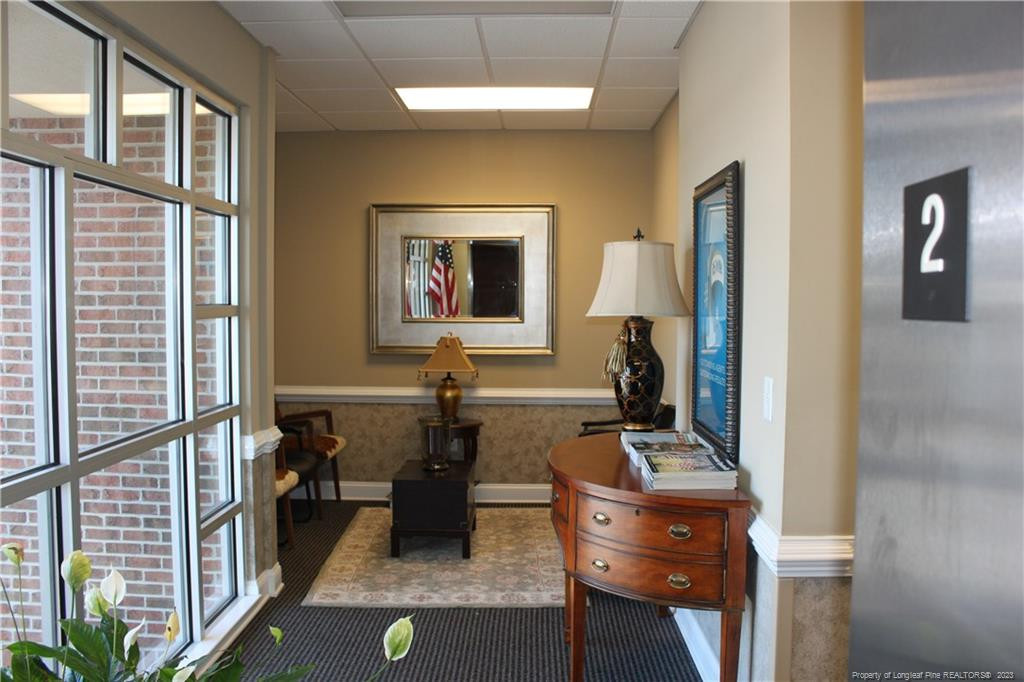 3709 Raeford Road Fayetteville, NC 28304 - Photo 18 of 44 a room with a couch and a flat screen tv