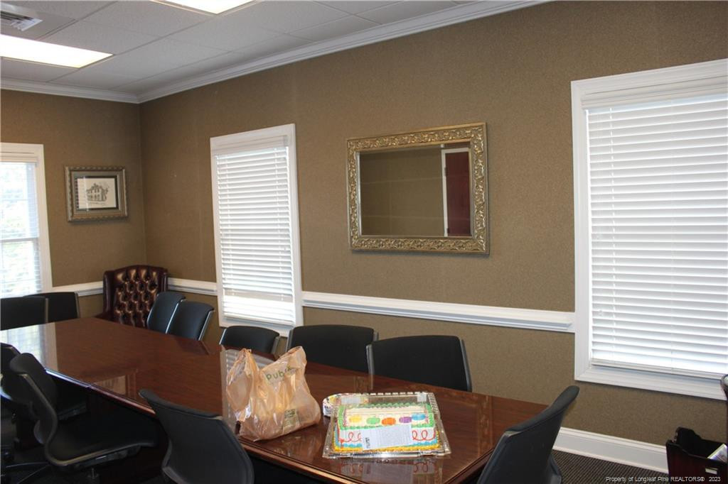 3709 Raeford Road Fayetteville, NC 28304 - Photo 23 of 44 a living room with furniture and a potted plant