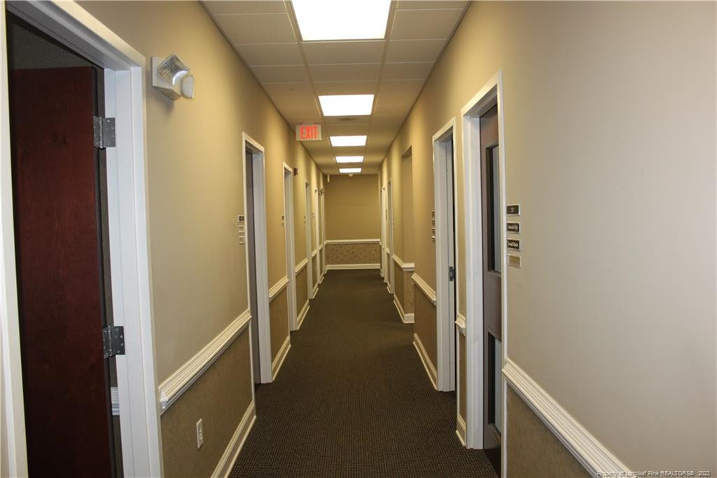 3709 Raeford Road Fayetteville, NC 28304 - Photo 26 of 44 a view of hallway with stairs