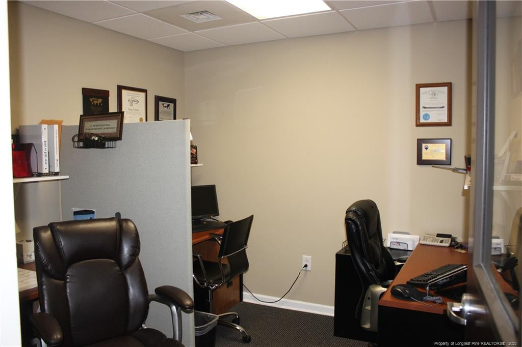 3709 Raeford Road Fayetteville, NC 28304 - Photo 27 of 44 a view of a workspace with furniture and a window