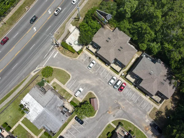 an aerial view of a house with outdoor space