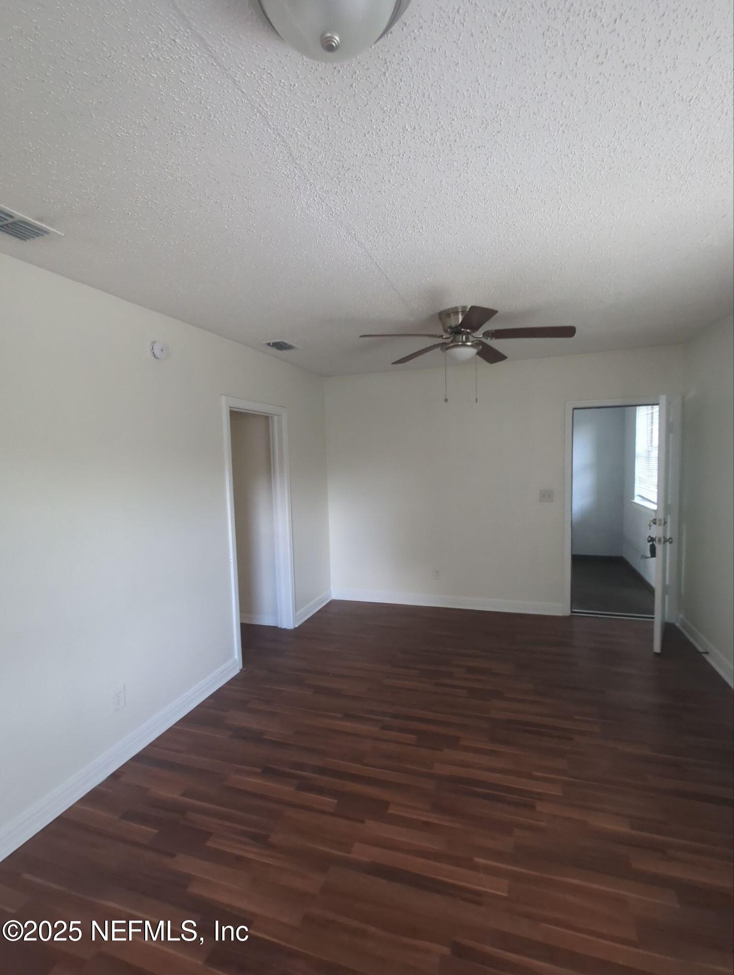 3136 Post Street Jacksonville, FL 32205 - Photo 11 of 16 a view of empty room with wooden floor