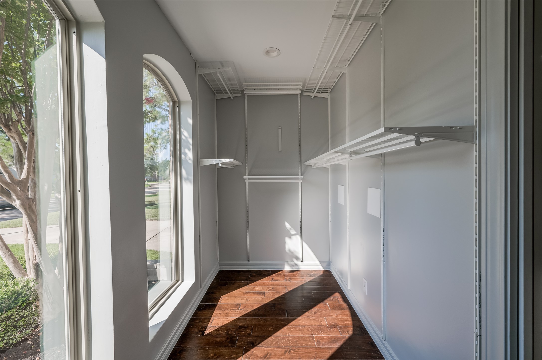 5527 Fragrant Cloud Court Houston, TX 77041 - Photo 21 of 38 a view of a hallway with wooden floor and entryway