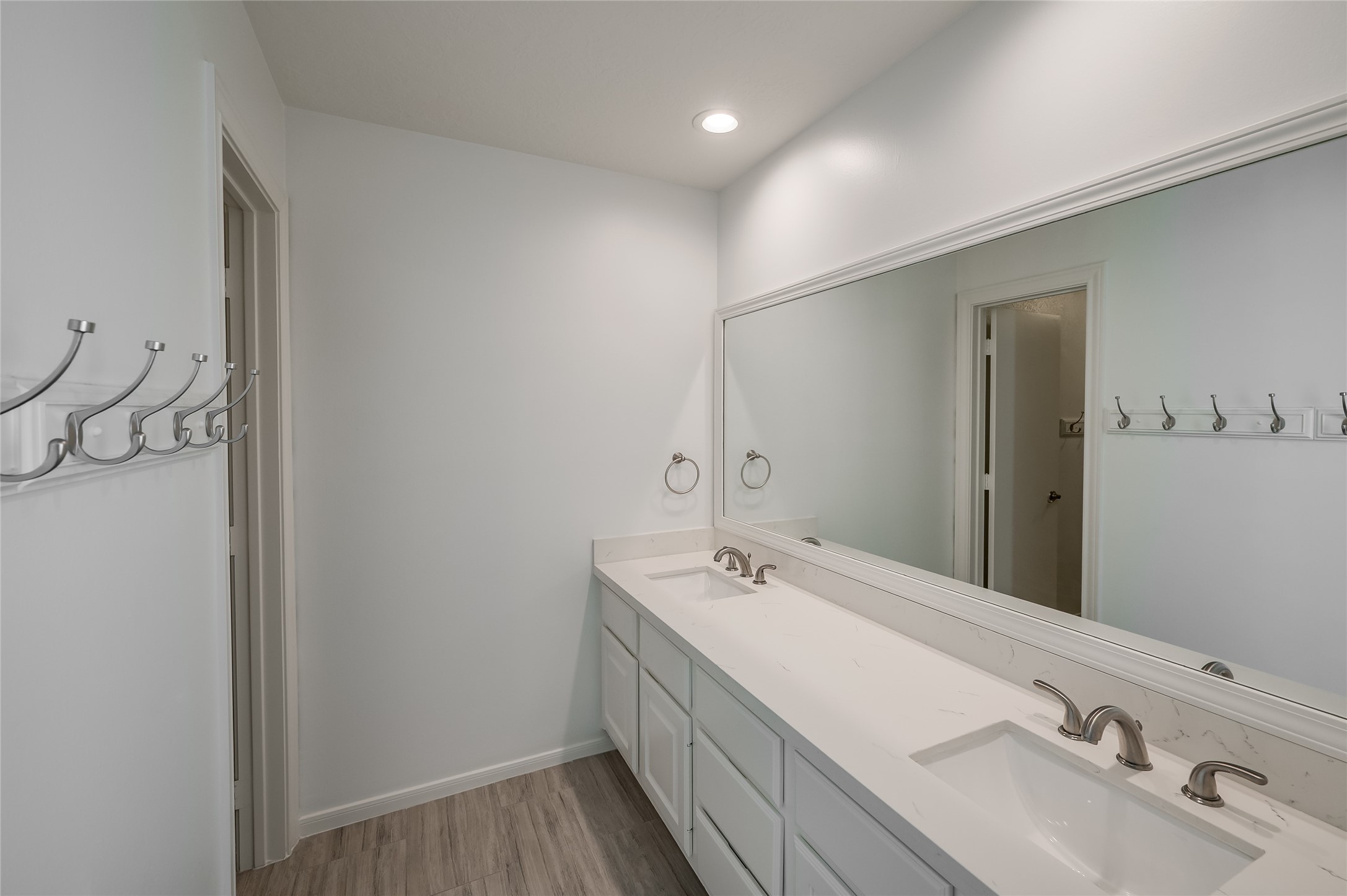 5527 Fragrant Cloud Court Houston, TX 77041 - Photo 24 of 38 a bathroom with a double vanity sink