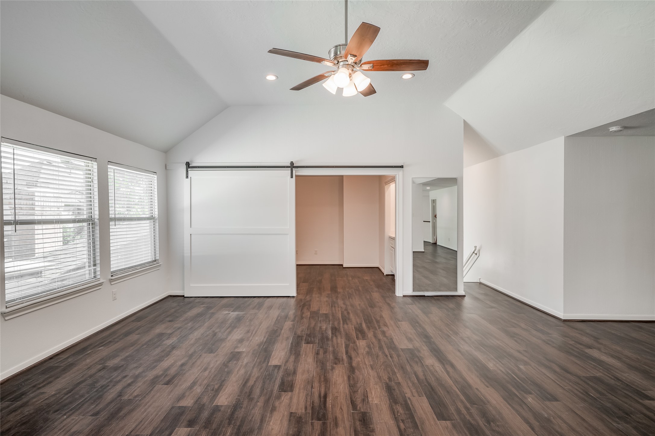 5527 Fragrant Cloud Court Houston, TX 77041 - Photo 30 of 38 wooden floor in an empty room with a window