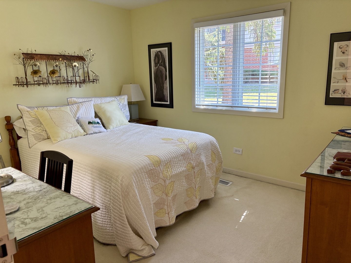 5802 Wolf Road, Unit 1 Western Springs, IL 60558 - Photo 13 of 16 a bedroom with a bed and next to a window